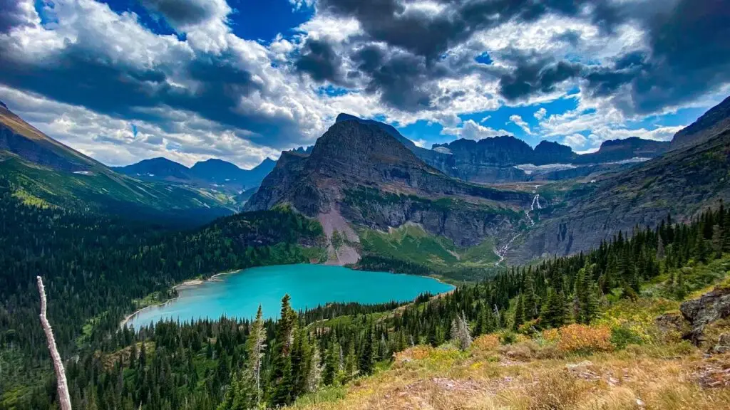 Glacier National Park, Montana blue sky blue lake mountain view