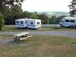 Wooded RV campsite at Starlite Camping Resort in Stevens, Pennsylvania
