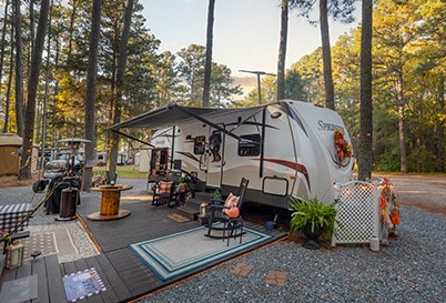 Wooded RV campsites at Thousand Trails PA Dutch Country in Manheim, Pennsylvania.